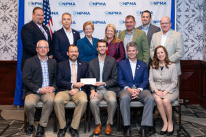 Copesan team presenting a check for pest management research and education in 2019.