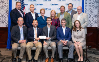 Copesan team presenting a check for pest management research and education in 2019.