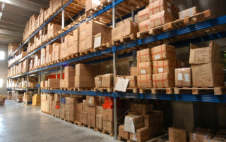shelves with boxes in stockroom